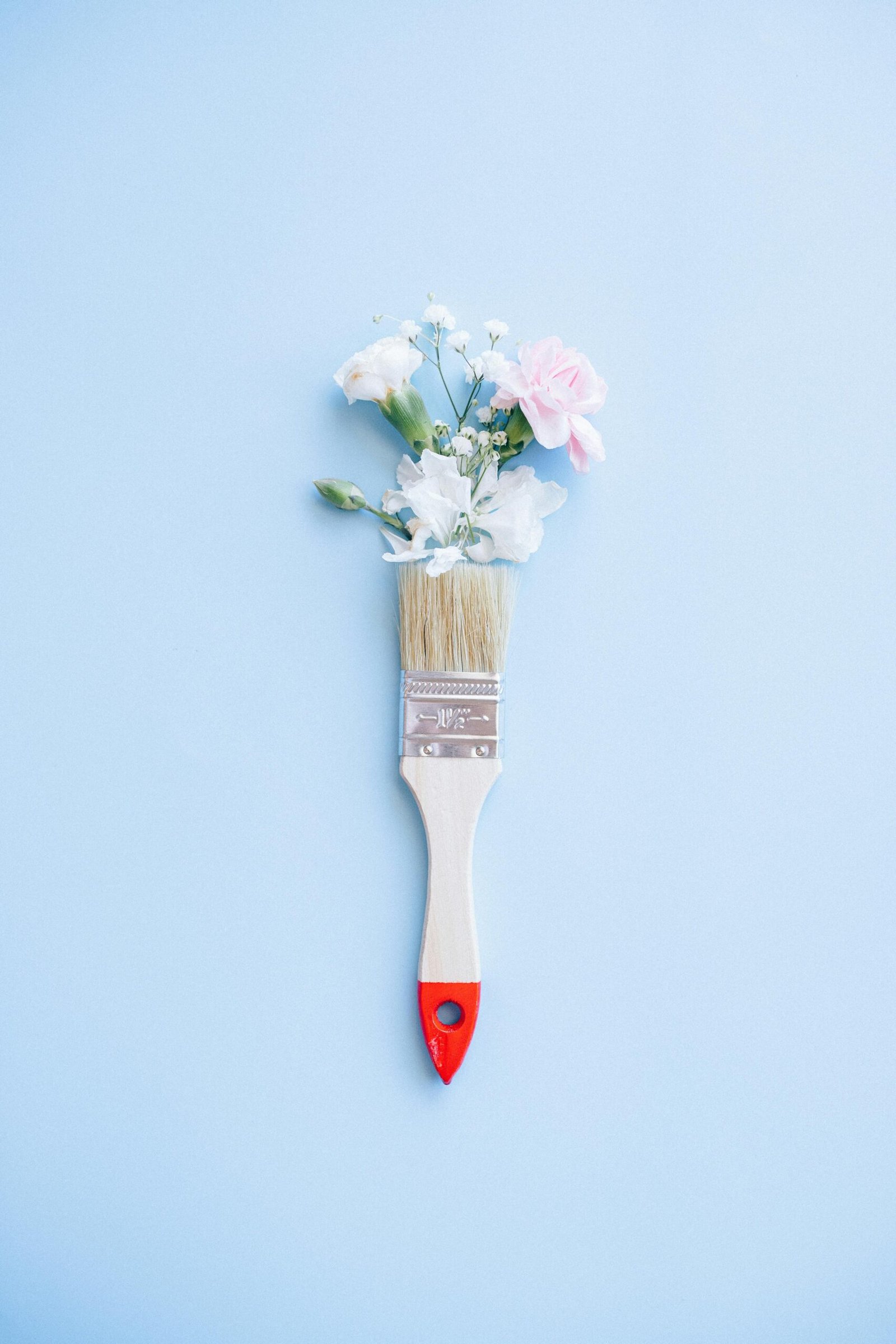 Brown Wooden Handled Red and White Paint Brush